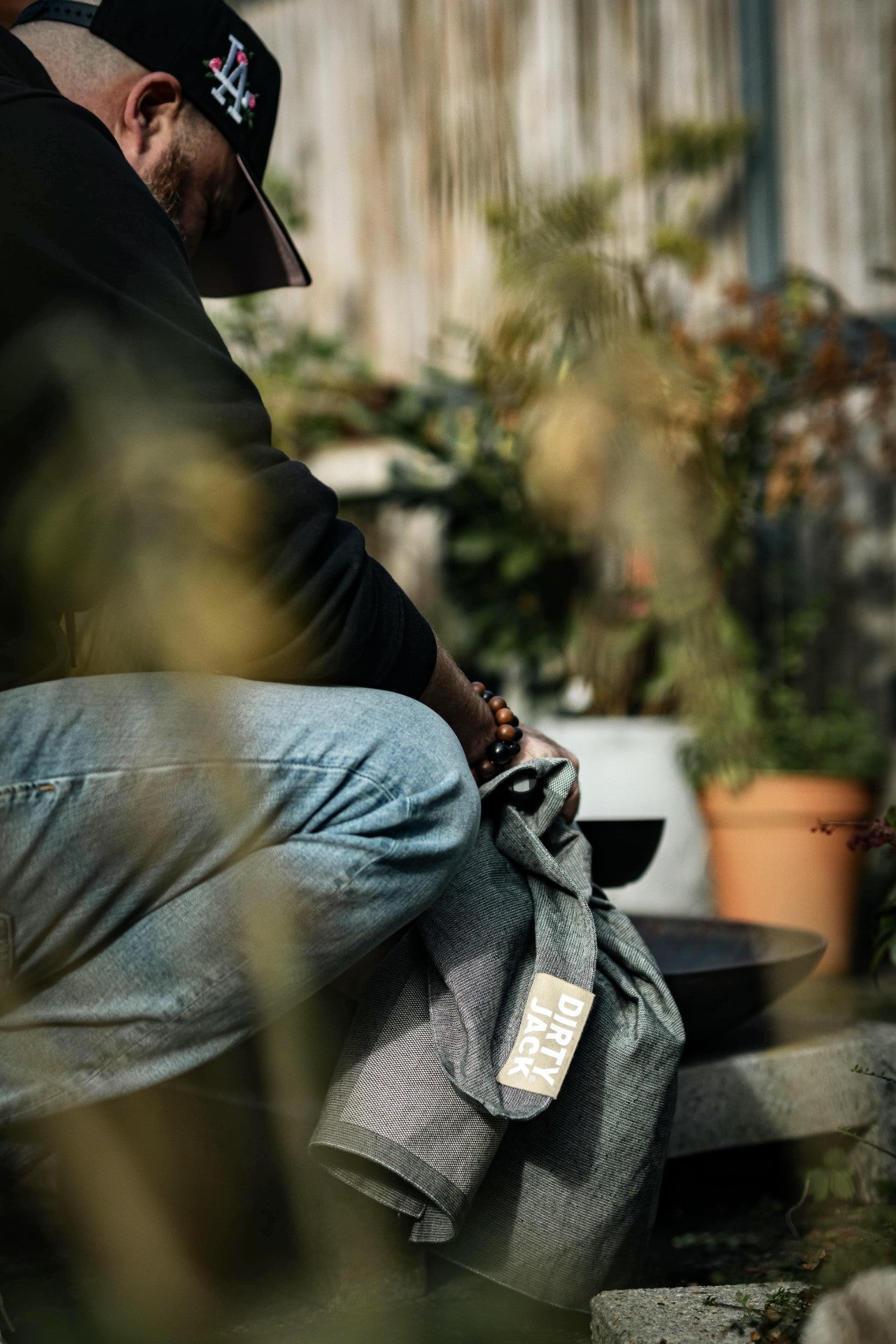 DIRTY JACK Kochtuch | Charcoal – Desert Sand Label